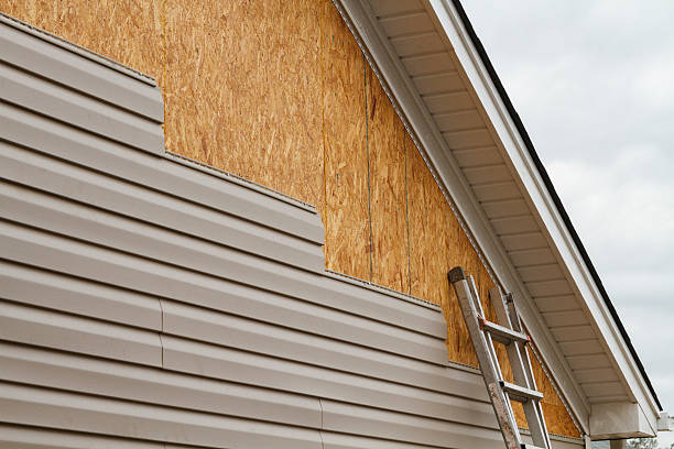 Professional Siding Installation technician working in Morganville, NJ
